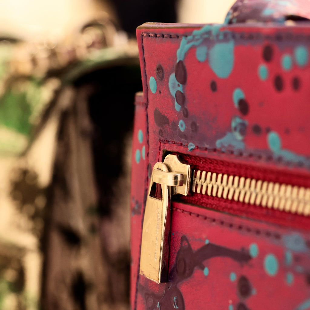 Back detail of The Maja Little “Stardust” highlighting hand-painted leather, refined zip construction, and contemporary Italian craftsmanship within the Arte-à-Porter capsule.