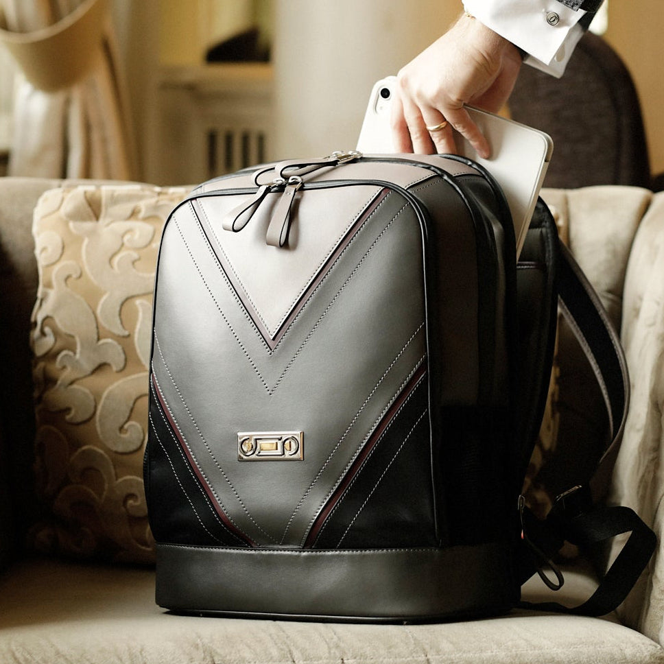 The Simona Backpack photographed in an editorial interior setting, expressing contemporary sophistication, functionality, and cosmopolitan elegance.
