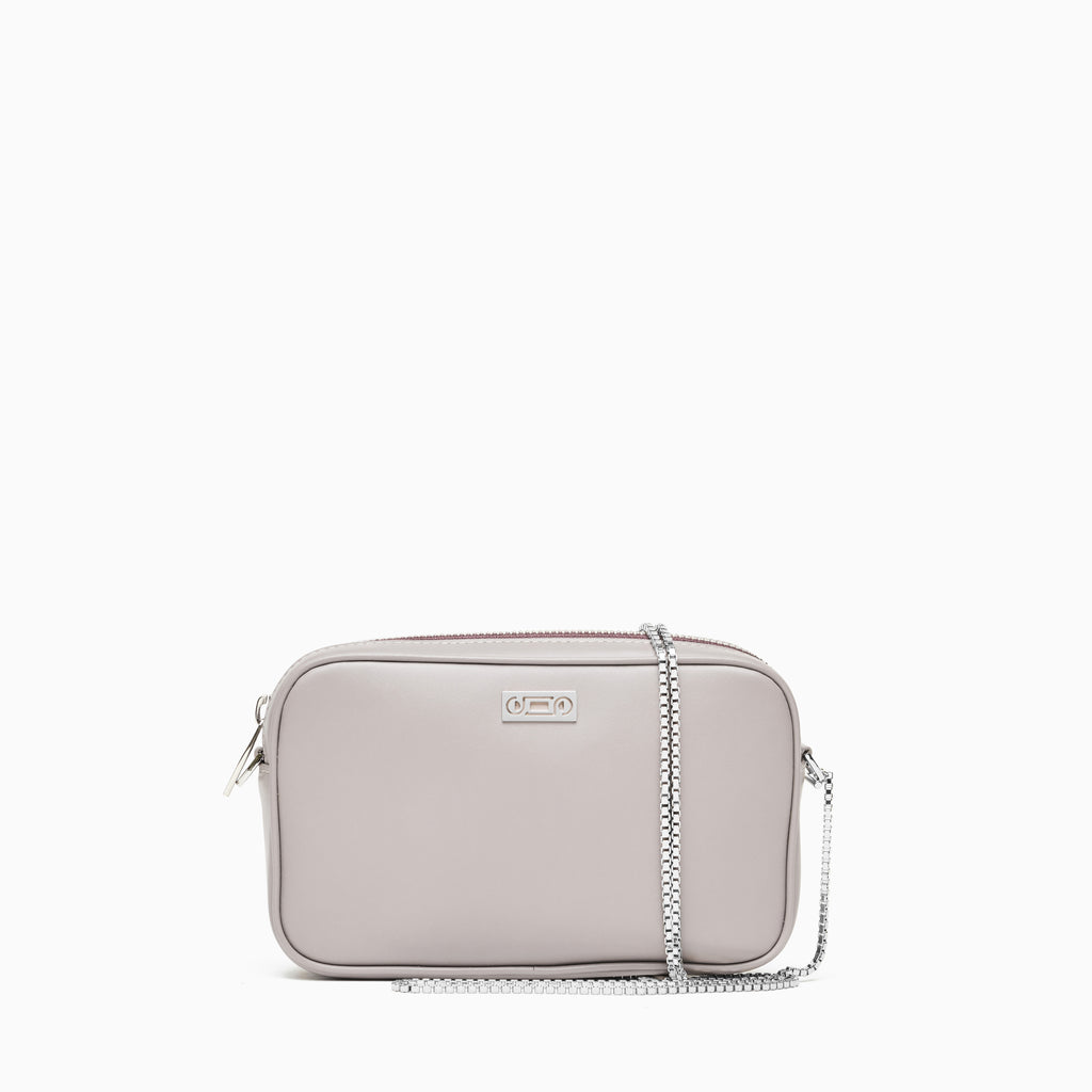 Front view of The Valentina Bag in Light Grey leather with refined minimalist construction, compact silhouette, and jewellery-inspired chain strap crafted in Italy.