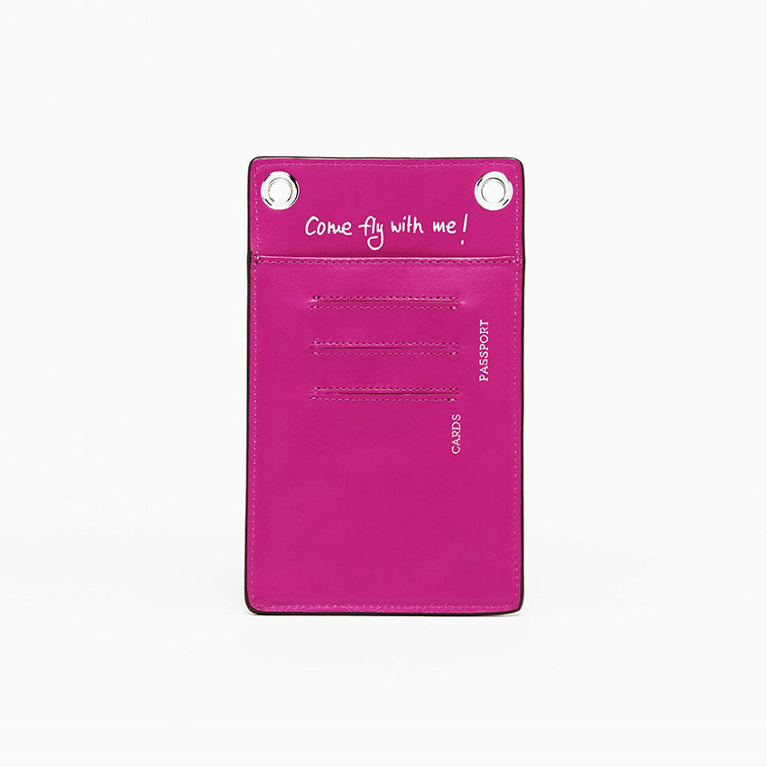 The Come Fly With Me! in Orchid. Back view showing smooth Italian leather with punched cursive inscription “Come Fly with Me!” and external slots for cards and passport.