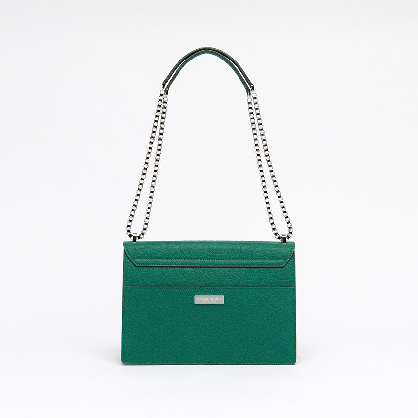 The Cristiana Vegan Shoulder Bag by Studio Tondini. Back view of the forest green version, showcasing clean architectural lines, a rear pocket, and the discreet branded plate.
