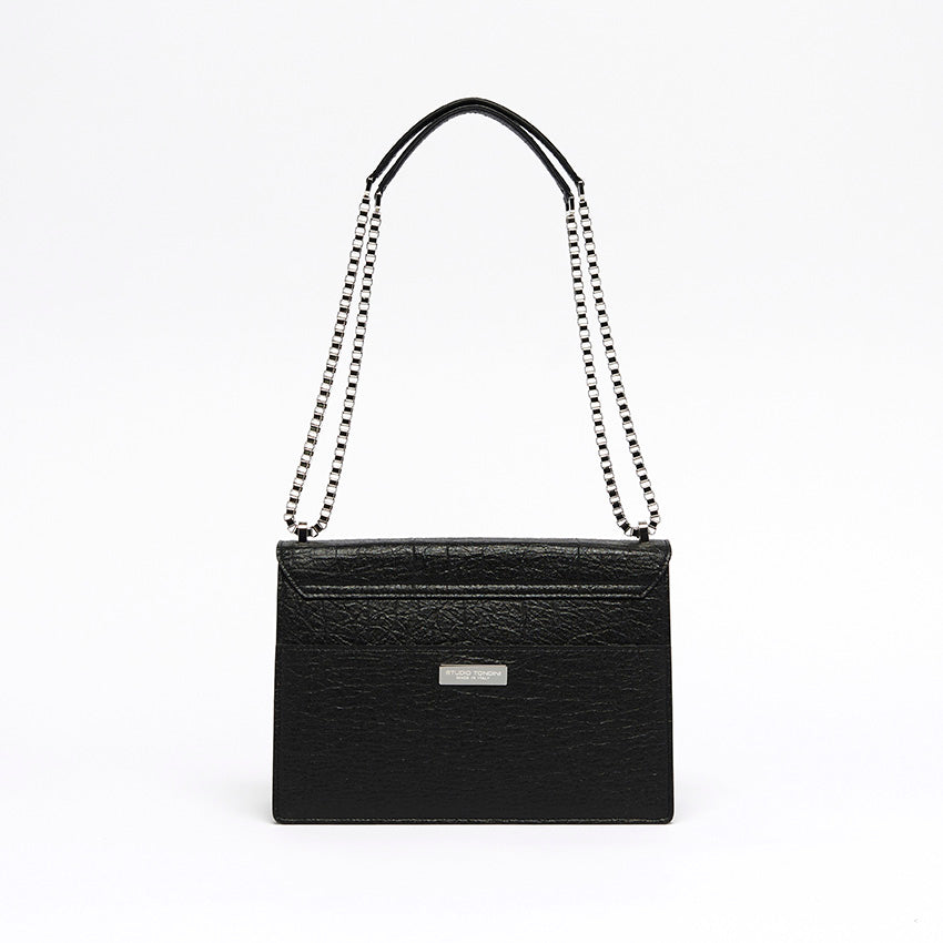Back view of The Cristiana Vegan Shoulder Bag in black Piñatex with clean architectural lines and understated elegance.