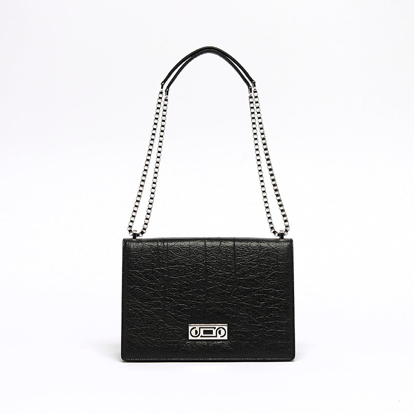 Front view of The Cristiana Vegan Shoulder Bag in black Piñatex with sculptural structure and contemporary Italian design.
