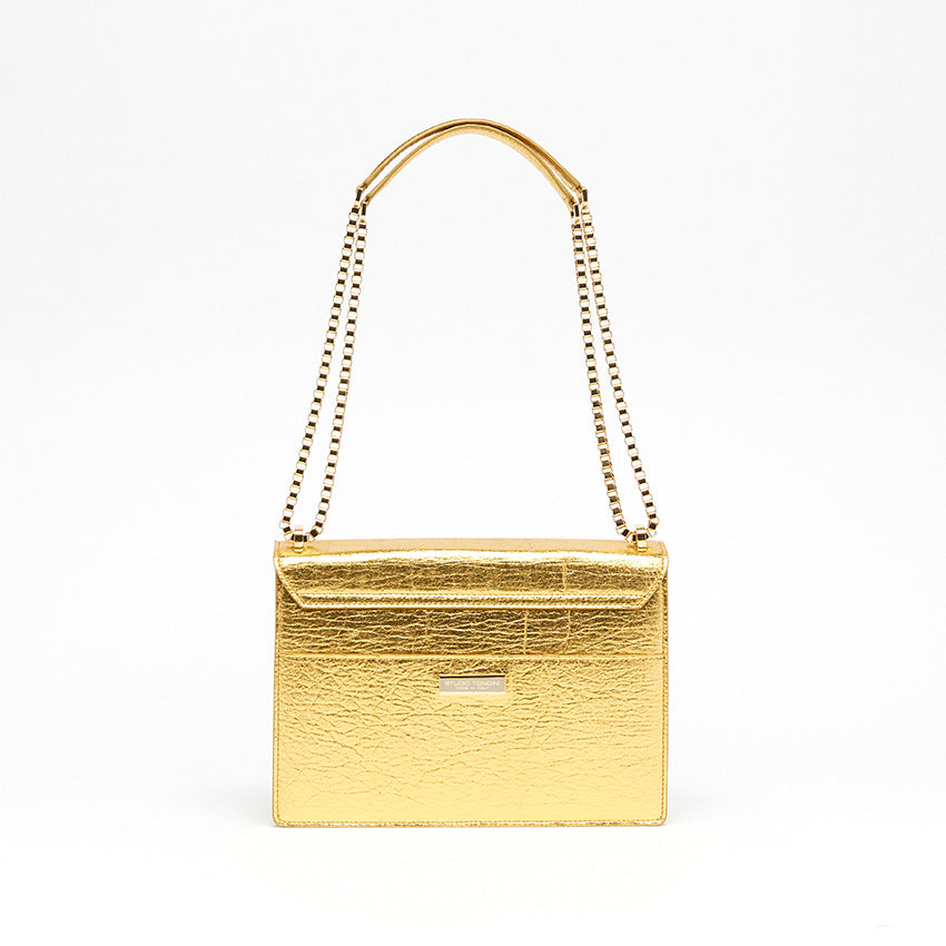 Back view of The Cristiana Vegan Shoulder Bag in gold Piñatex with clean lines and understated contemporary elegance.