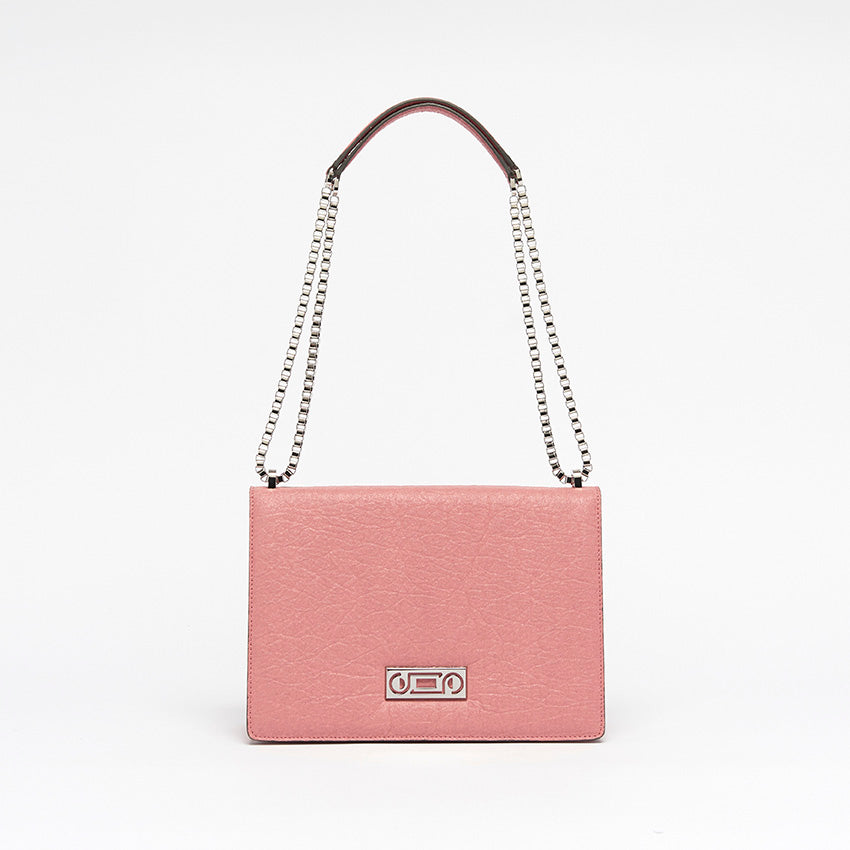 Front view of The Cristiana Vegan Shoulder Bag in pink Piñatex with sculptural proportions and refined Italian construction.