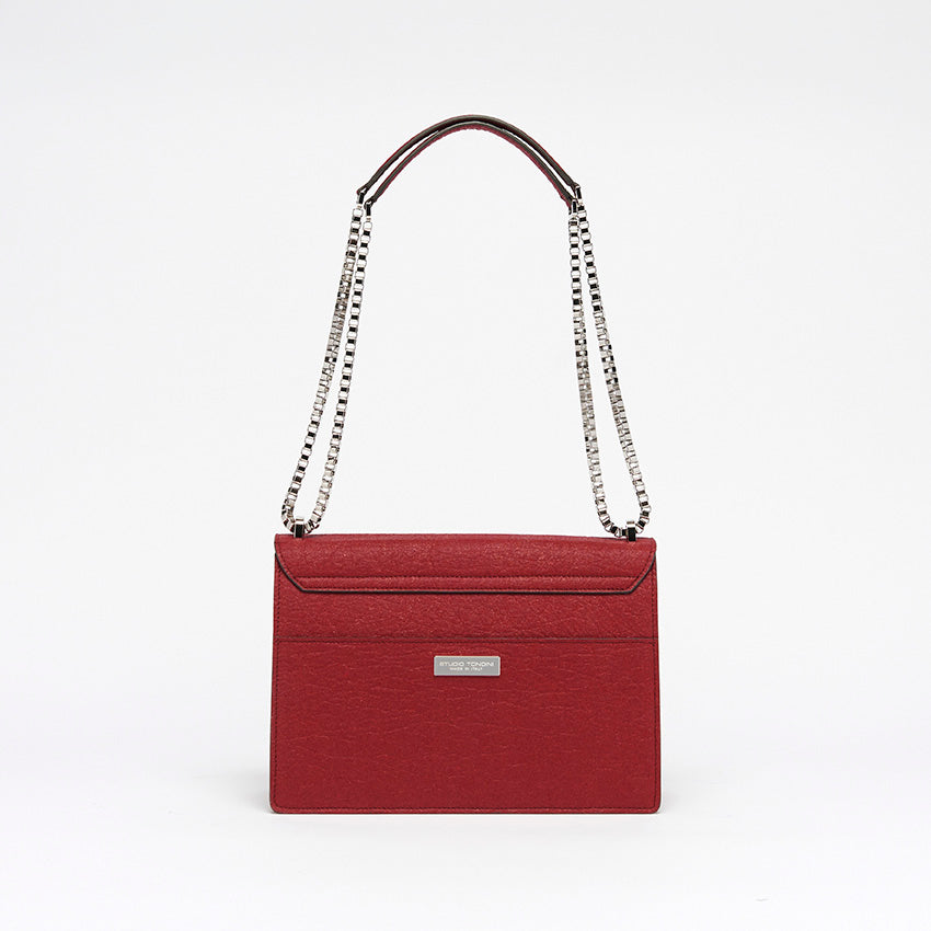 Back view of The Cristiana Vegan Shoulder Bag in red Piñatex featuring clean lines and understated sophistication crafted in Italy.