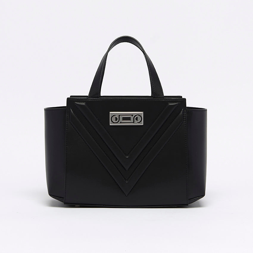 Front view of The Maja Little Tote Bag in black leather with signature V-shaped design, structured silhouette, and contemporary Italian craftsmanship.