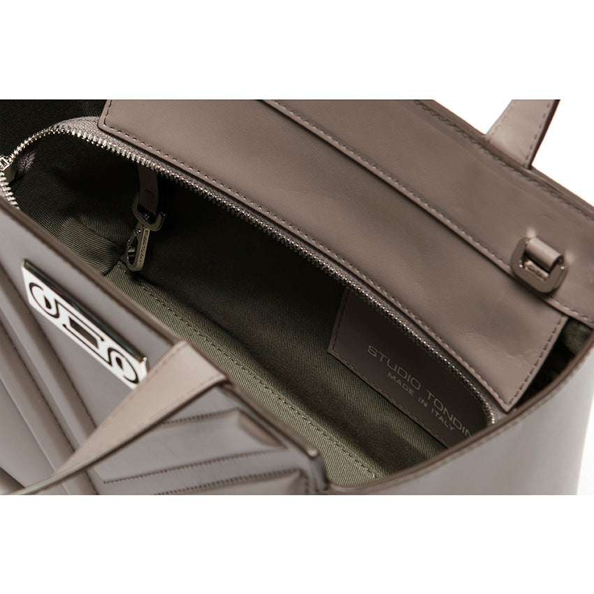 Interior detail of The Maja Little Tote Bag showing structured organisation, soft lining, and refined Italian leather construction.