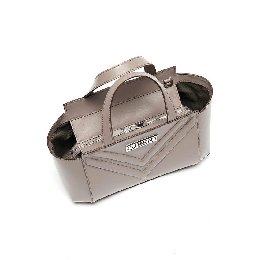Top view of The Maja Little Tote Bag in Light Grey leather highlighting sculptural volume and compact architectural structure.