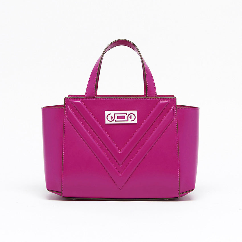 Front view of The Maja Little Tote Bag by Studio Tondini in vibrant Orchid leather, featuring signature V-shaped construction, structured silhouette, and architectural lines crafted in Italy.
