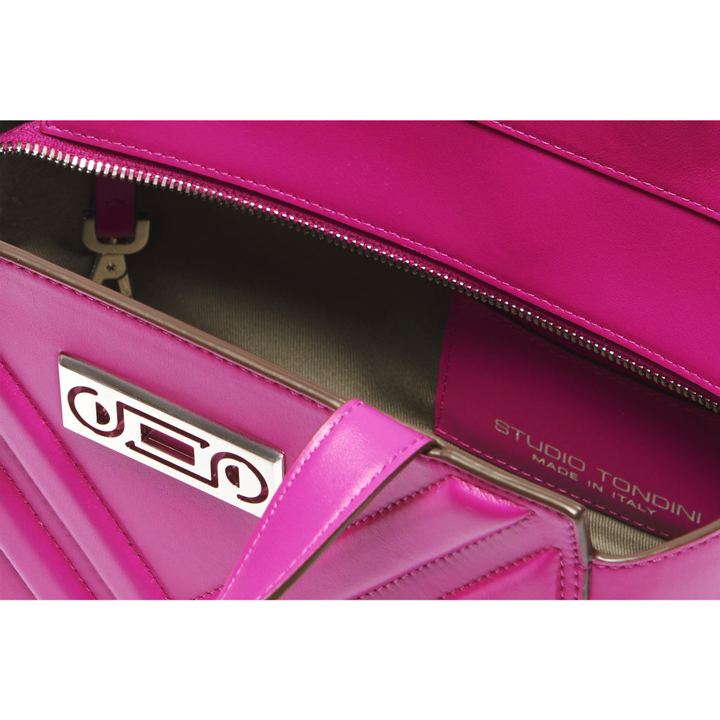 Interior detail of The Maja Little Tote Bag showing organised compartments, refined lining, and thoughtful leather craftsmanship designed for everyday movement.