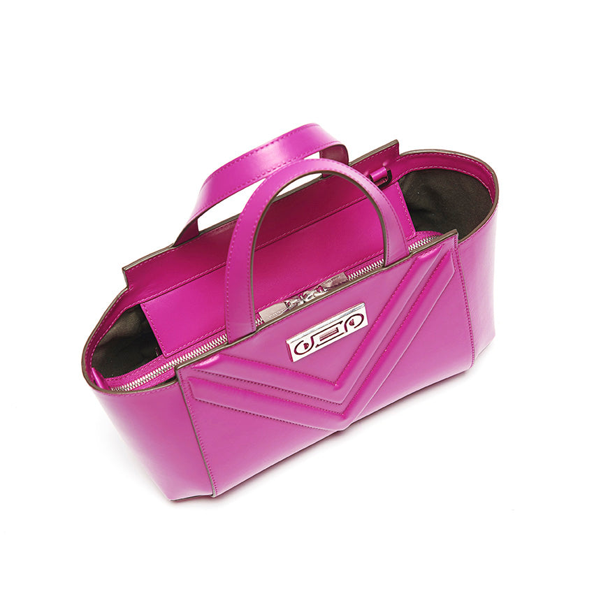 Top view of The Maja Little Tote Bag in Orchid leather highlighting structured depth, architectural geometry, and compact everyday proportions.