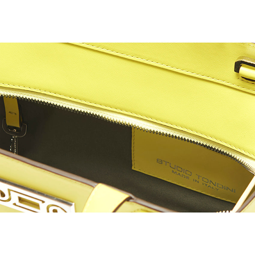 Interior view of The Maja Little Tote Bag highlighting organised compartments, tactile materials, and thoughtful functionality designed around real life.