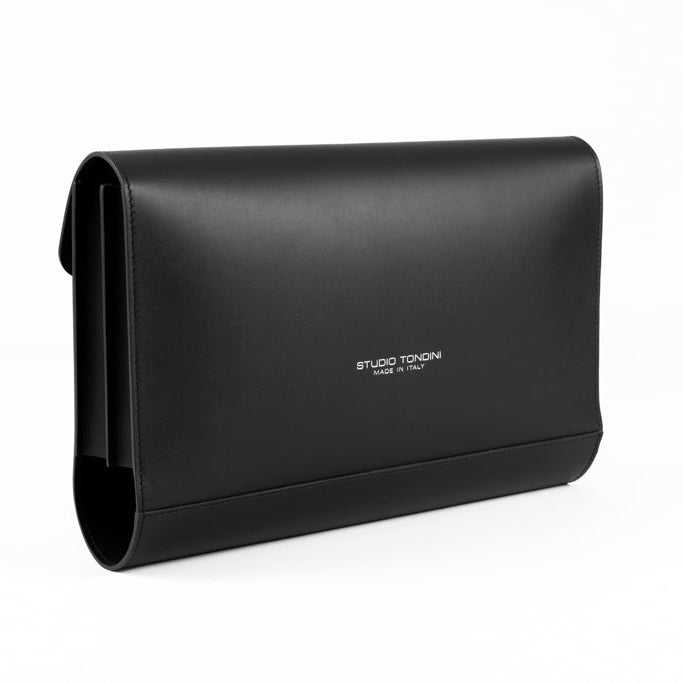 Three-quarter view of The Document Holder in total black smooth leather, showcasing slim construction and understated elegance.