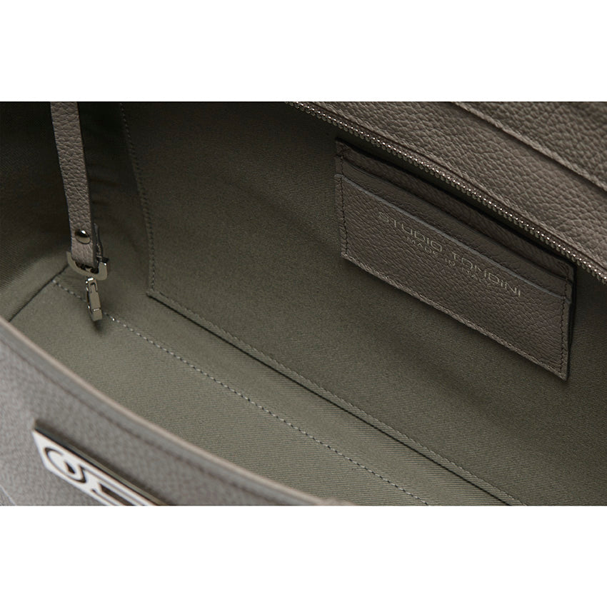 Interior detail of The Maja Monochrome Tote Bag, highlighting refined organisation, zip opening, and smooth lining.