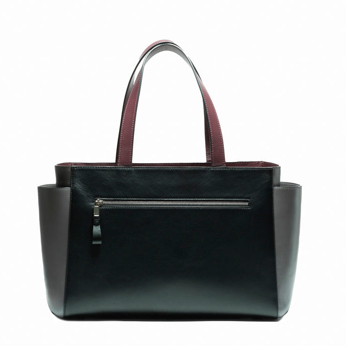 Back view of The Maja Tote Bag in smooth black leather with clean structural lines and minimalist contemporary design.
